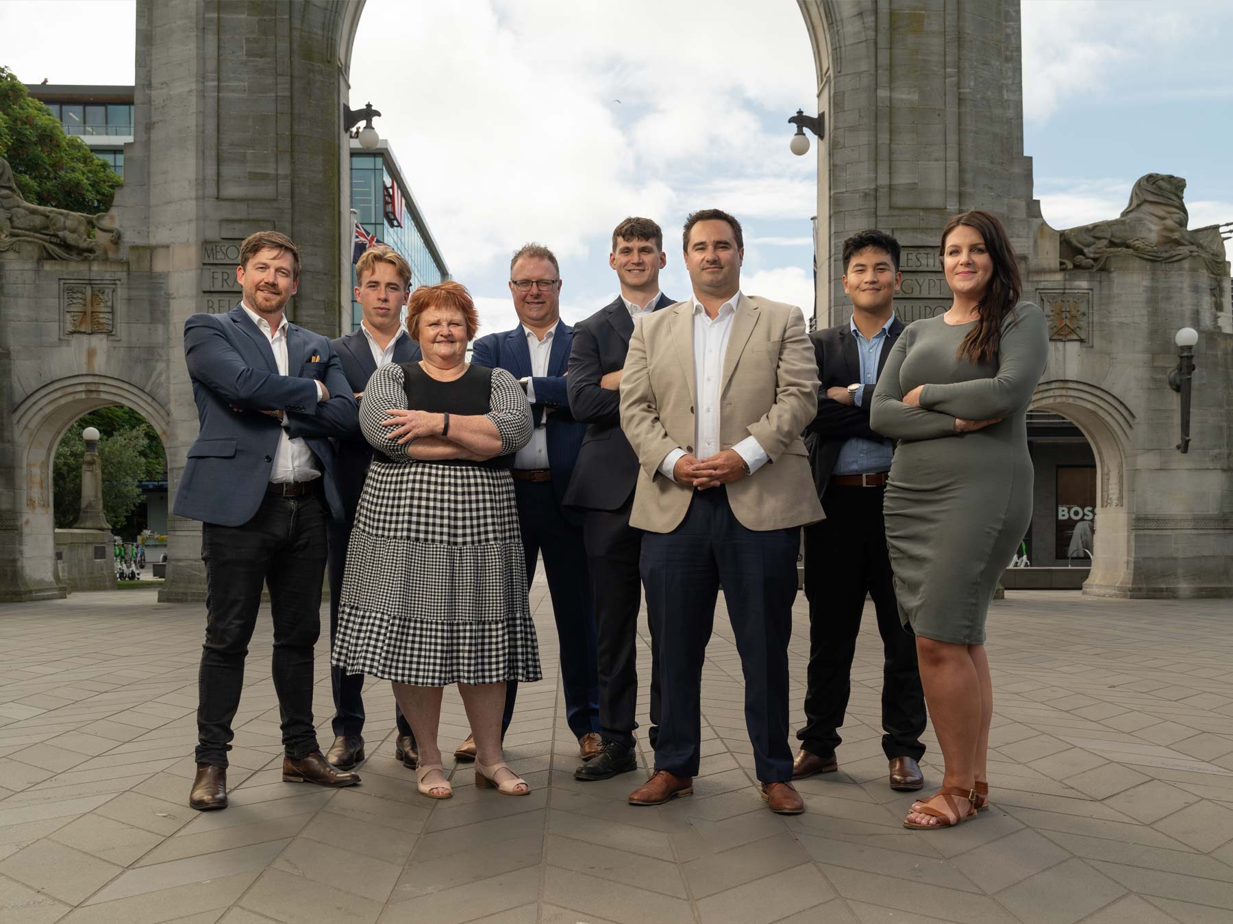 The Resure team standing in front of the Bridge of Remembrance in Christchurch